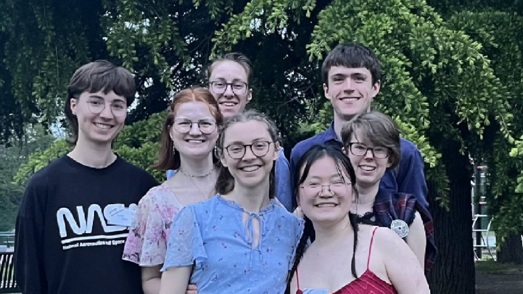 Winner of the Jean Milligan Memorial Fund Scholarship smiles with fellow Young dancers in Lyon at the Spring Fling 2026