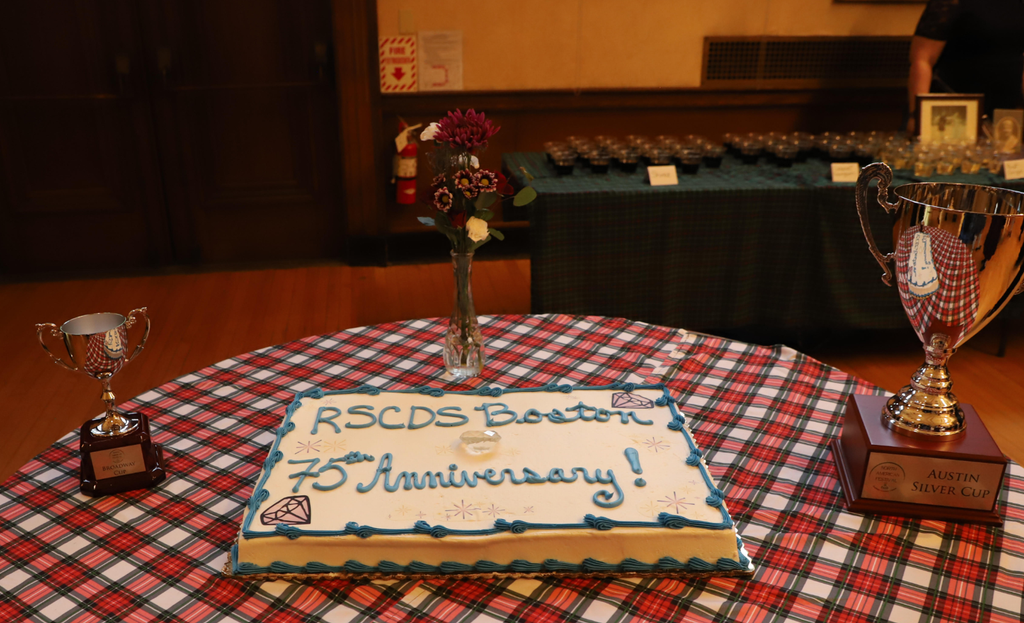 75th Anniversary cake, flanked by awards from the recent North American Festival